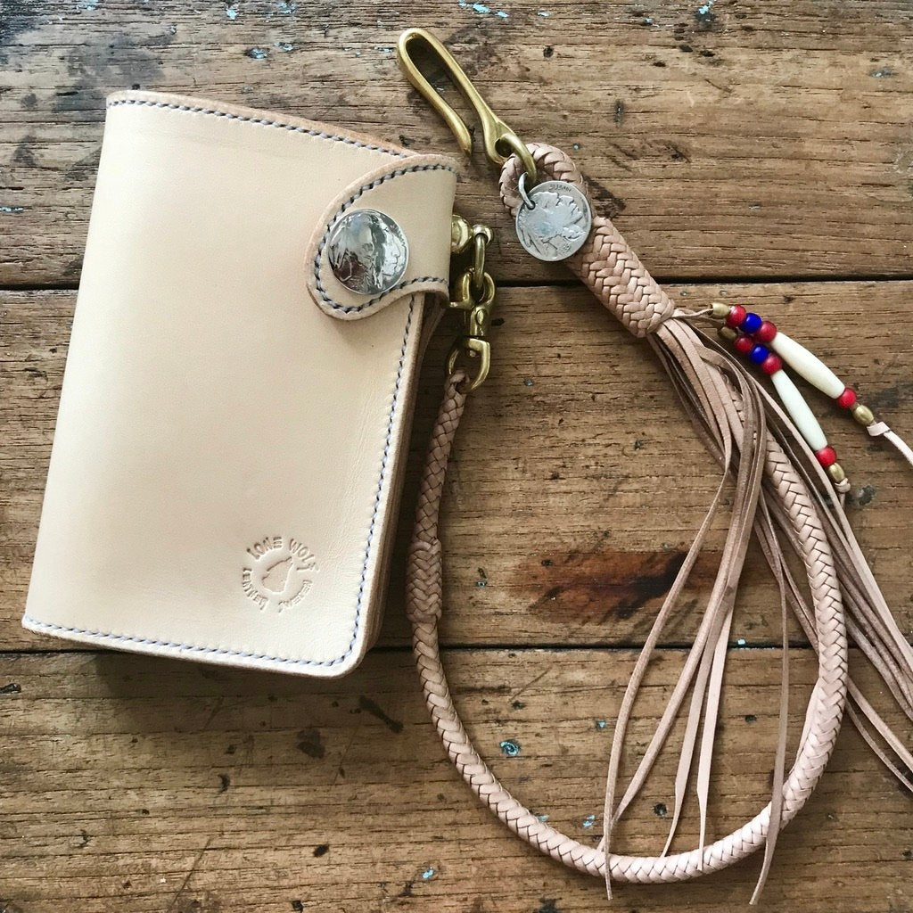 Hand braided wallet tether in organic leather Barnes and Moore